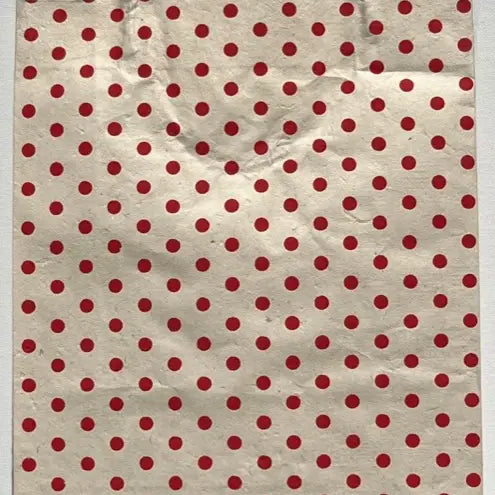 red dots on cream wrap sheet