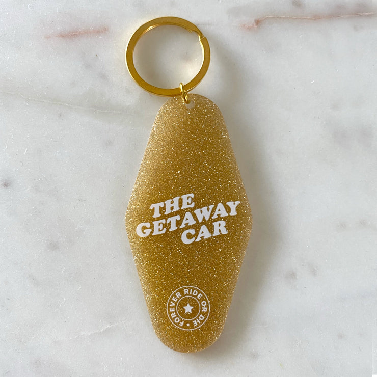 getaway car motel glitter keychain