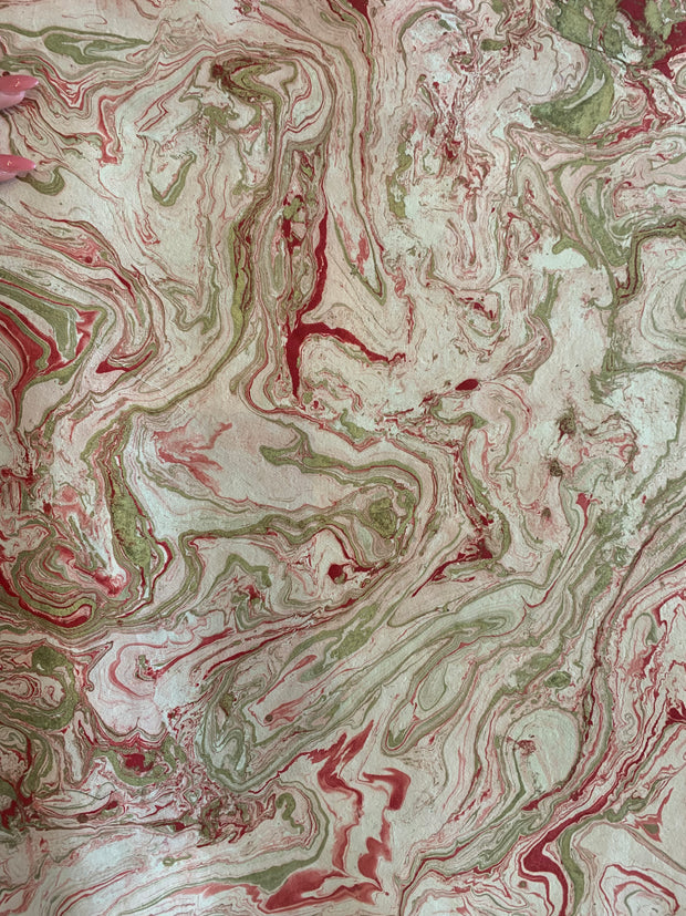 marble, red and gold on cream