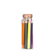 colored pencils in glass jar