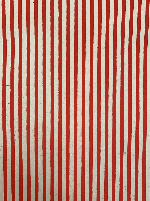 red stripes on cream sheet