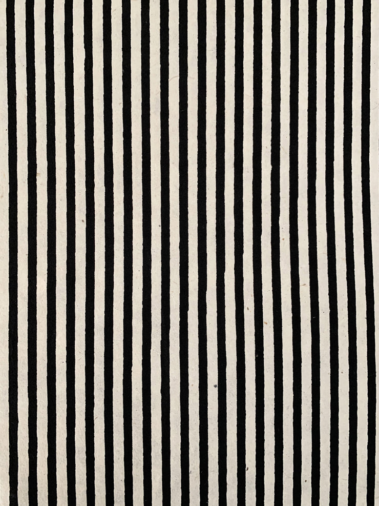 black stripes on cream sheet